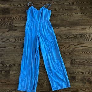 Free People denim blue jumpsuit size s/m